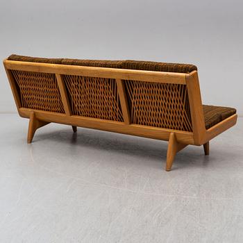 CARL GUSTAF HIORT AF ORNÄS, an oak 'Studio' sofa from Puunveisto Oy - Träsnideri Ab, designed in 1954.