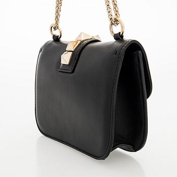 Valentino Garavani, a 'Glam Lock' bag.