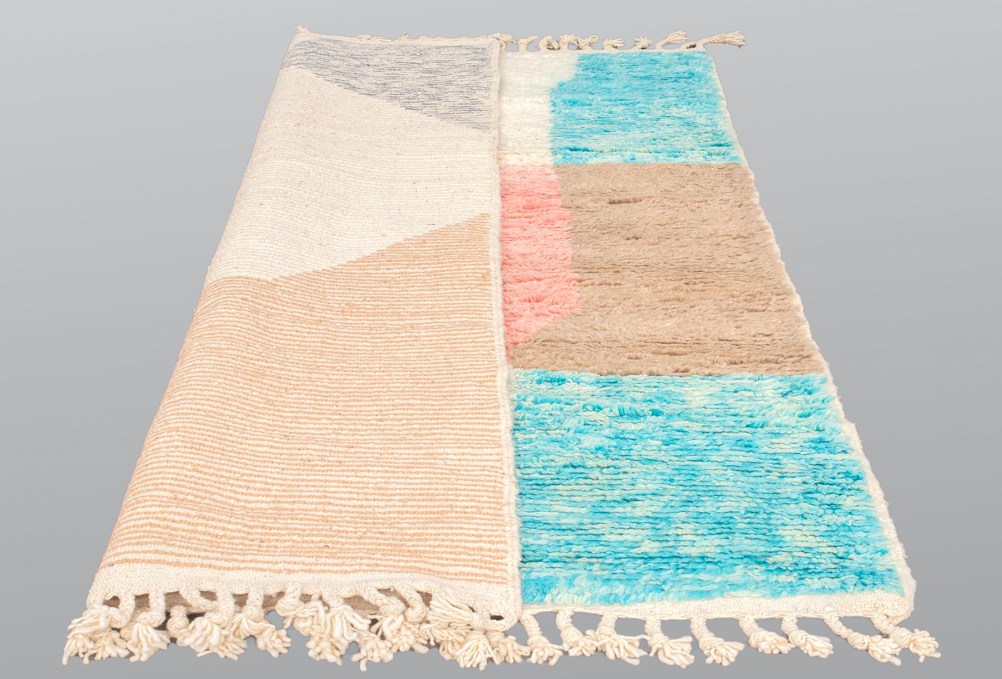A Moroccan carpet, 238 x 150 cm.