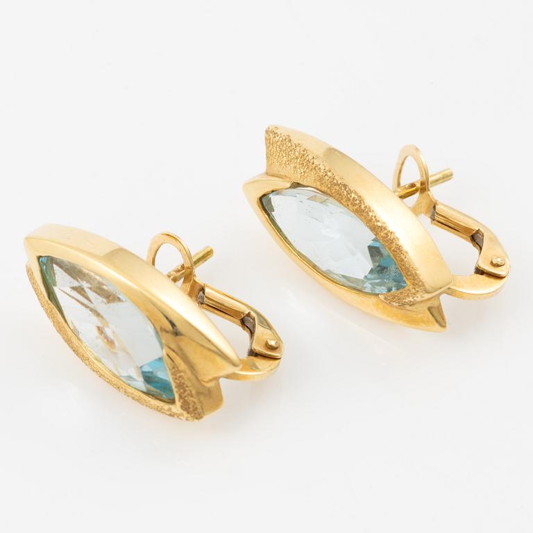 Earrings, 18K gold set with navette-cut blue topazes.