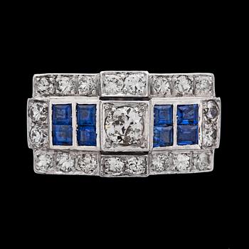 948. RING, briljantslipade diamanter, tot. ca 1.60 ct och carréslipade safirer, 1950-tal.