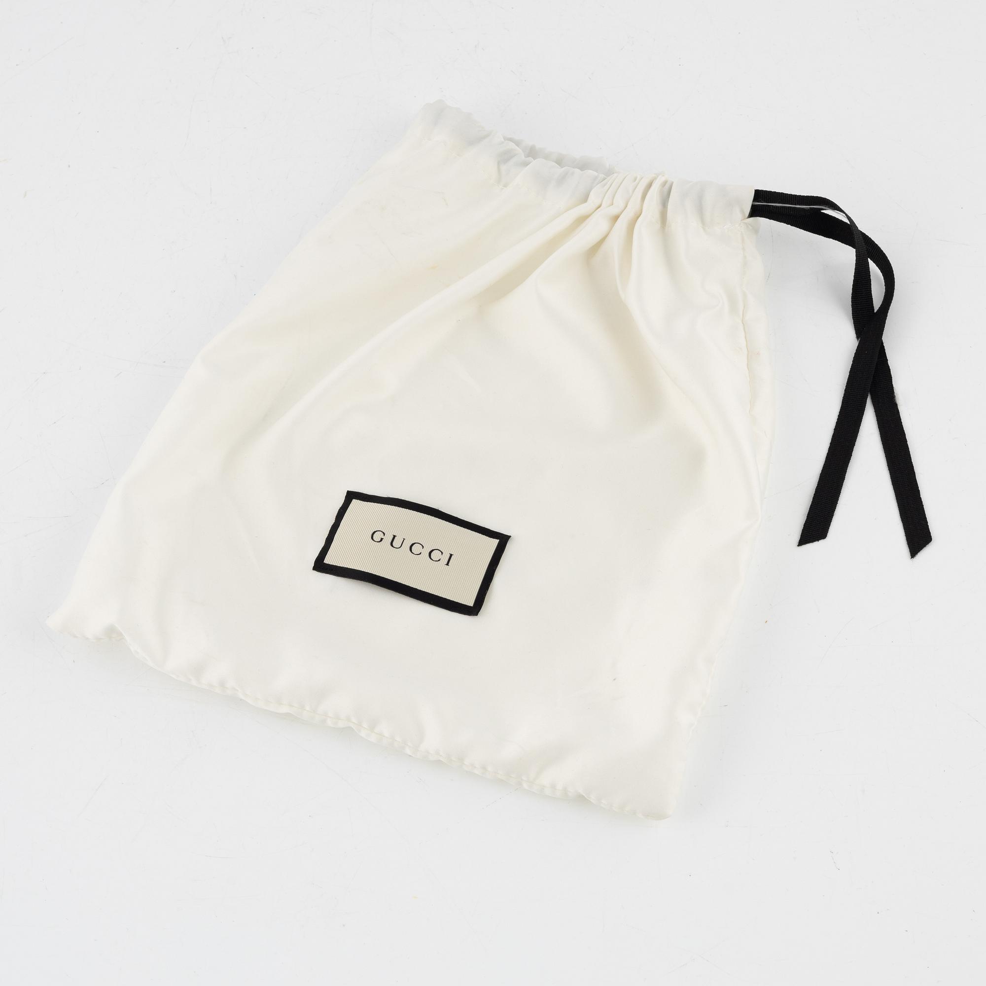 Gucci, a black leather 'Interlocking G' bag.