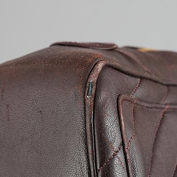 Chanel, a burgundy leather handbag, 1989-91.