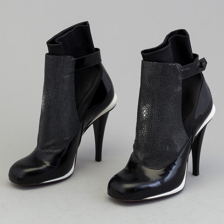 a pair of boots by Fendi.