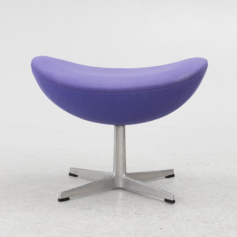 Arne Jacobsen, an armchair with footstool, "The Egg", Fritz Hansen, Denmark, 2003.