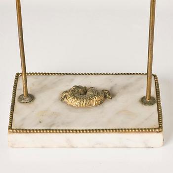 A Gusttavian gilt brass, white marble and tole two-light reading lamp, late 18th century.
