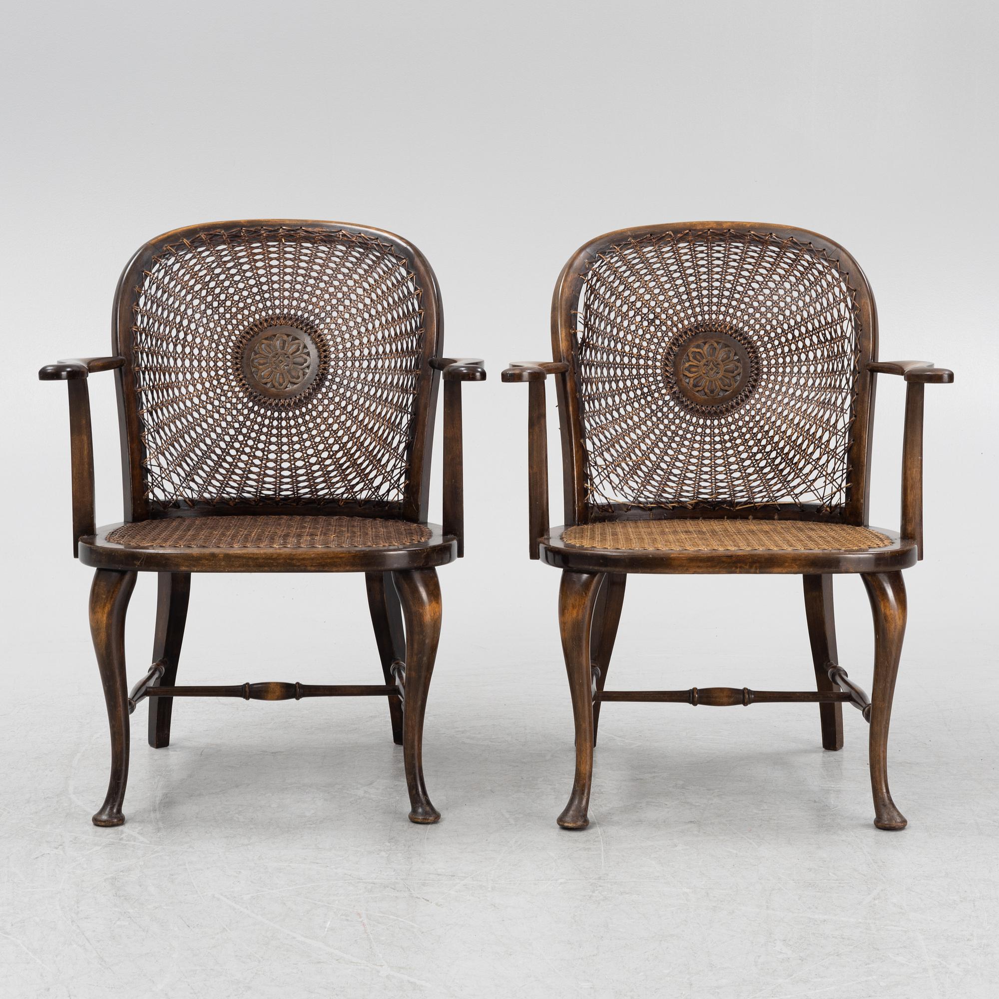 A pair of rattan chairs, first half of the 20th Century.