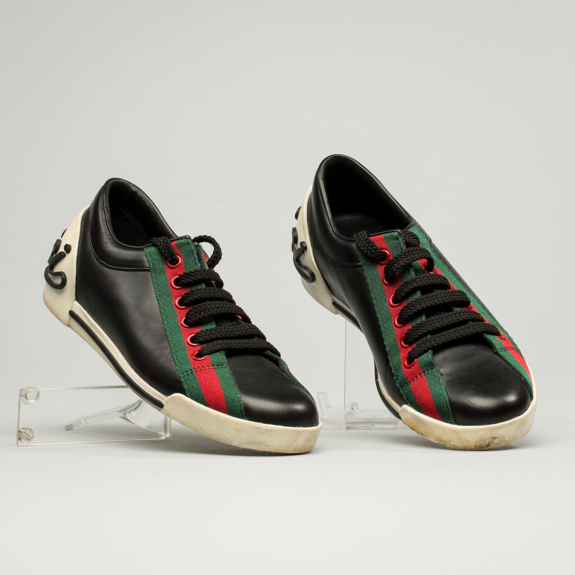 SKOR, Gucci.