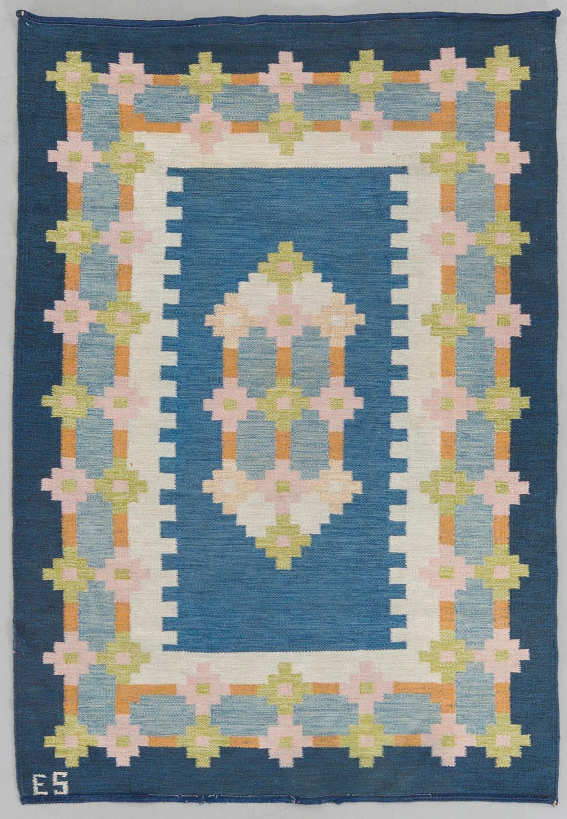 A flat weave carpet from the second half of the 20th century.
