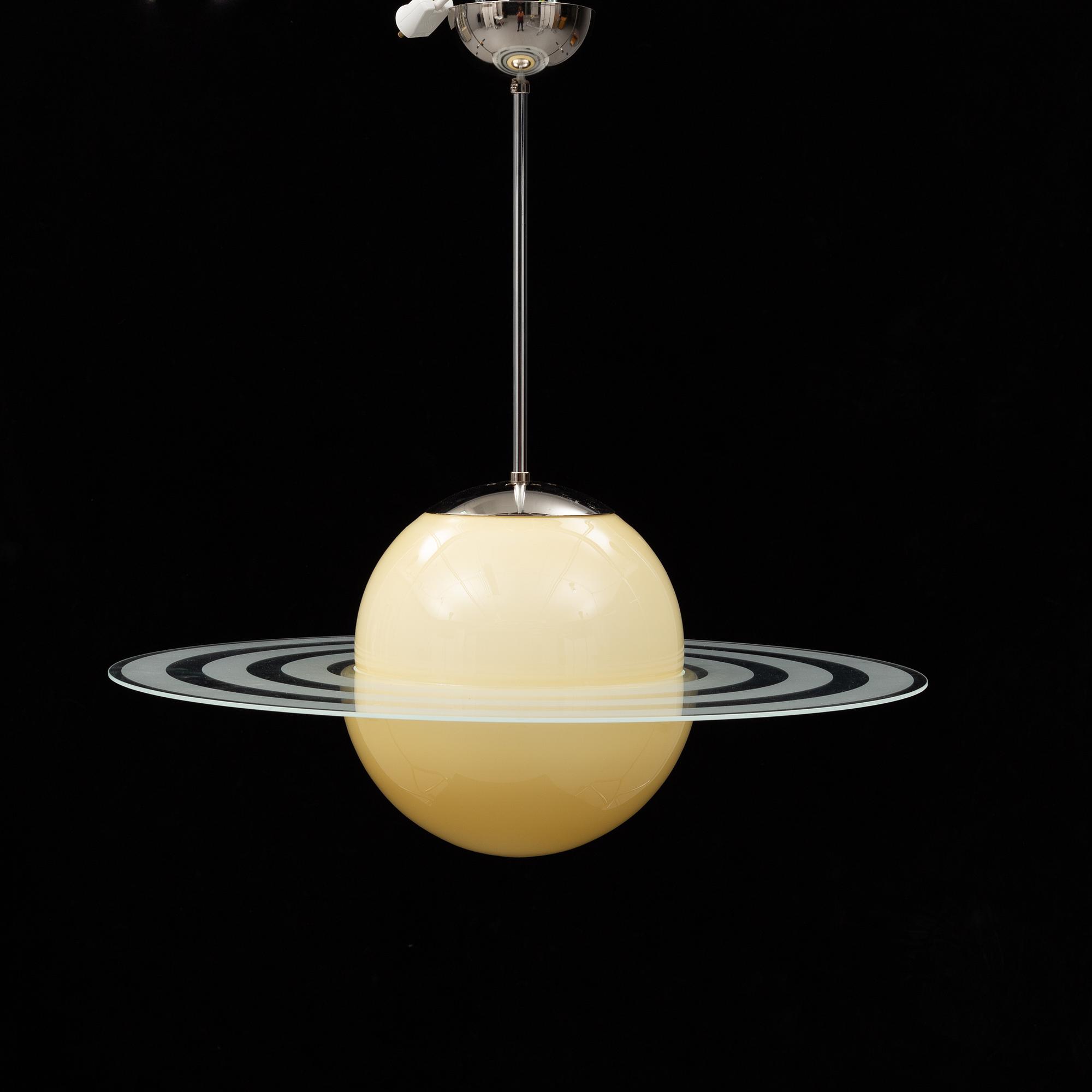 a 20th century ceiling lamp in the shape of Saturn.