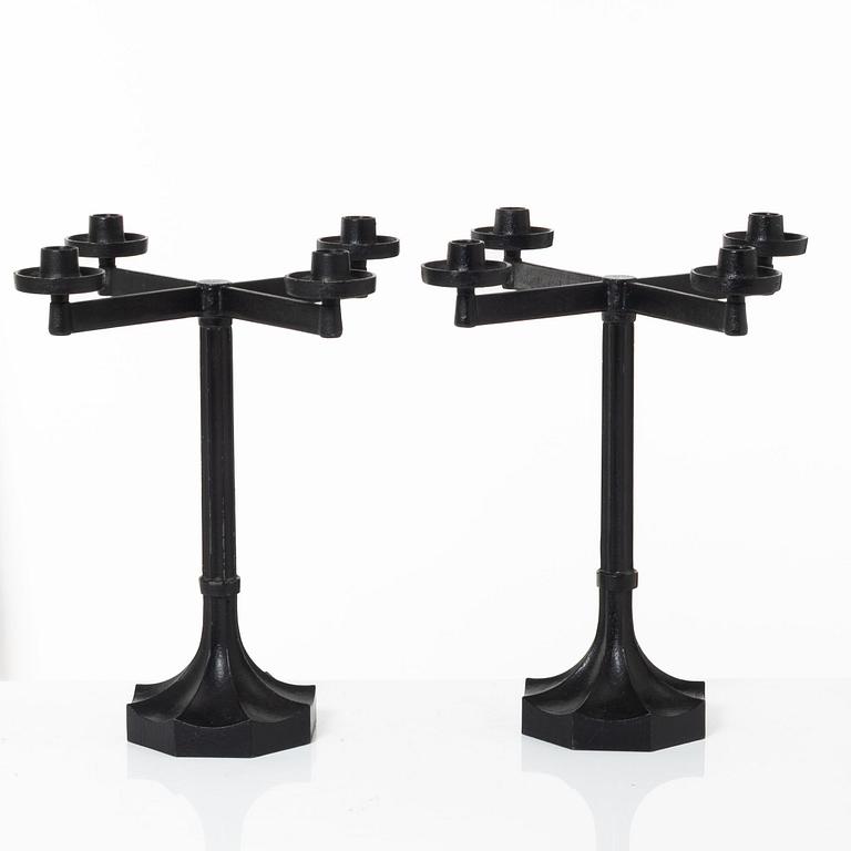 Sigurd Persson, a pair ofa cast iron candelabras, Kockums 1965.