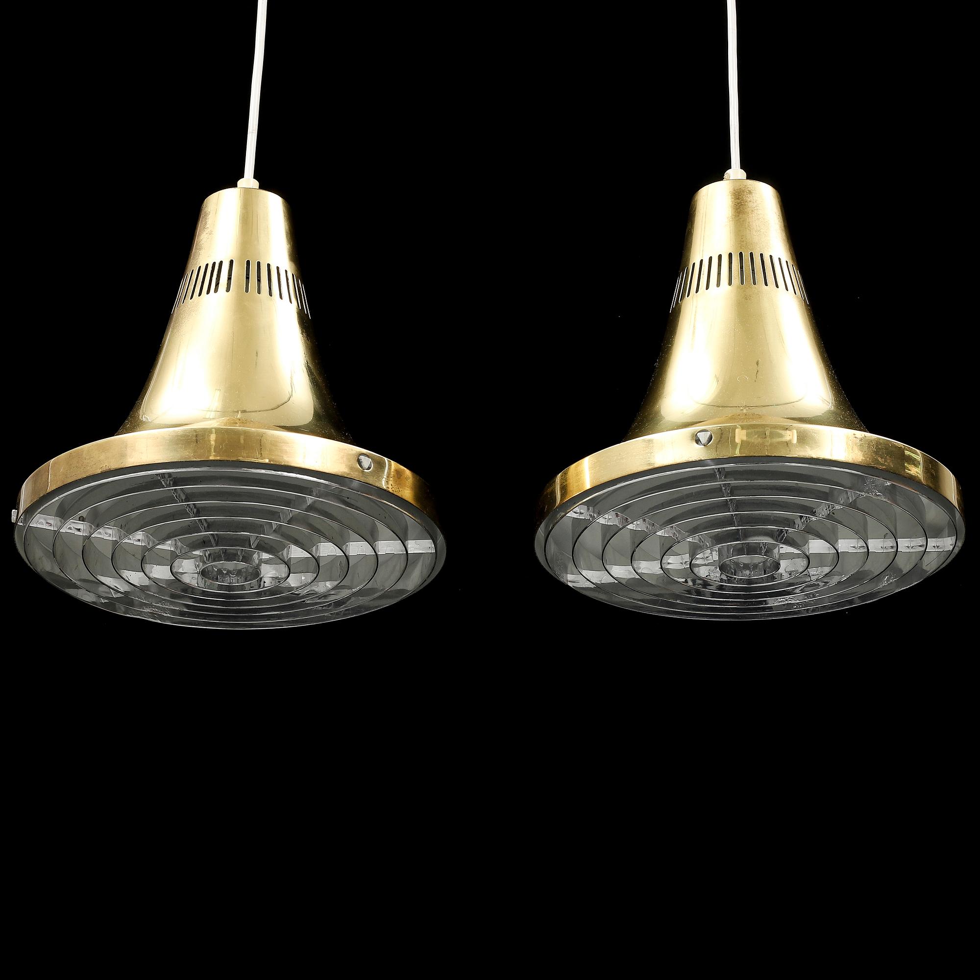 HANS-AGNE JAKOBSSON, a pair of brass ceiling lamps, Markaryd, 1960/70s.