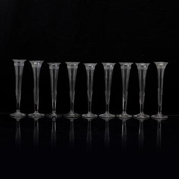 Nine glass champagne flutes, 19th Century.