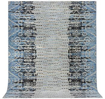 An oriental carpet, c. 302 x 244 cm.