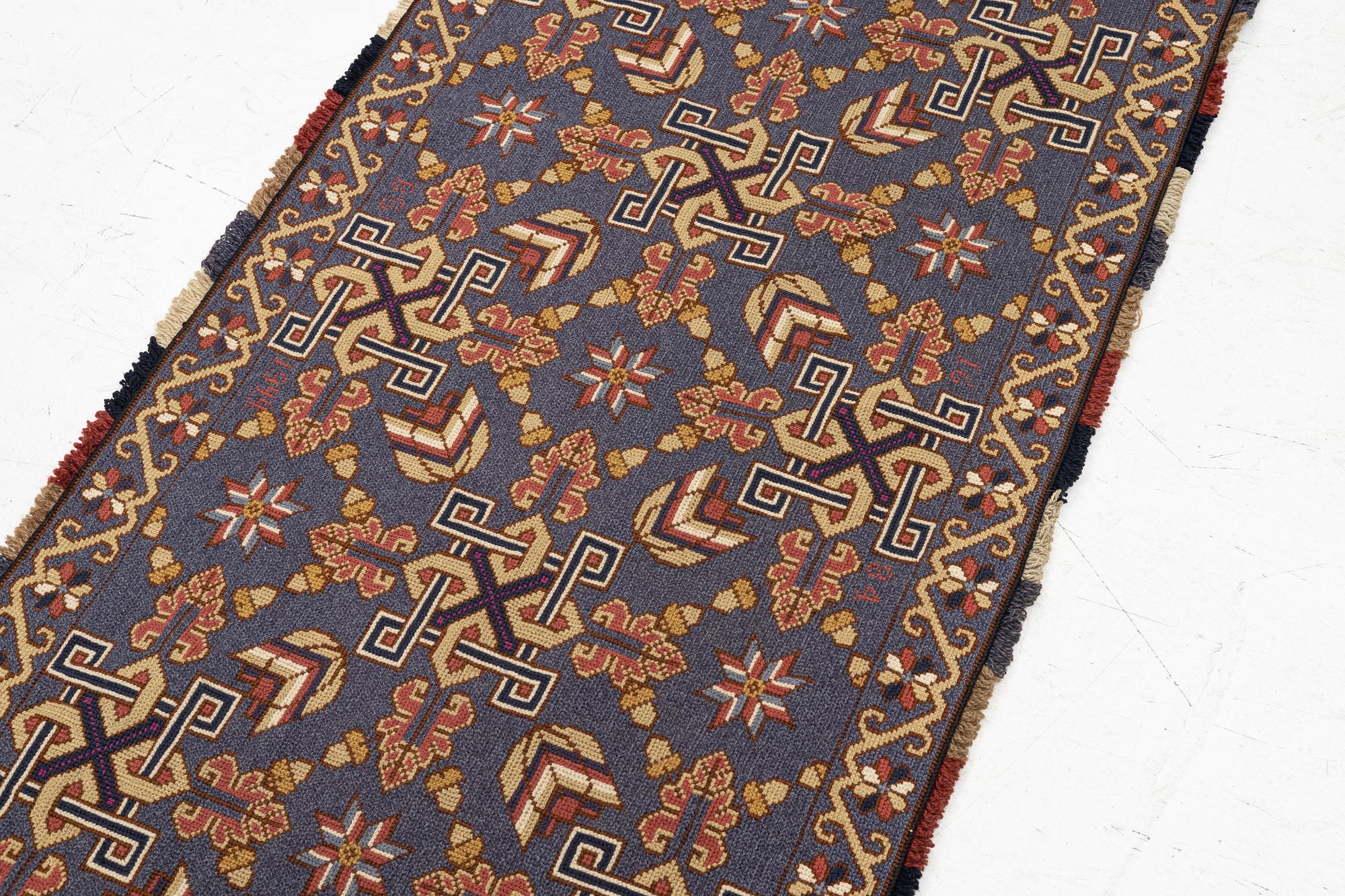 A twizt stich bench cushion from Scania. C 187 x 79 cm Circa 1900.