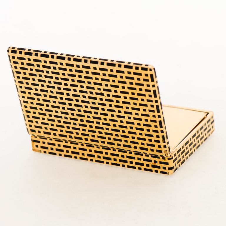 A CARTIER VANITY CASE, 18K gold, enamel, baguette cut diamond. France 1930s.