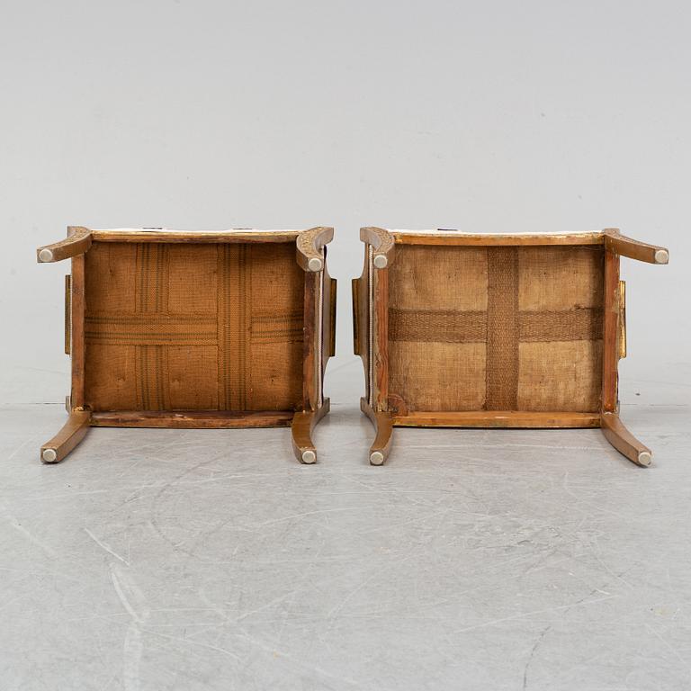 A pair of bronzed stools, 20th Century.