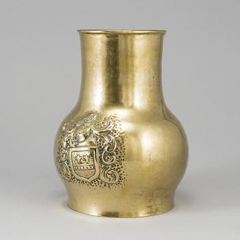 A 19th century brass champagne cooler.