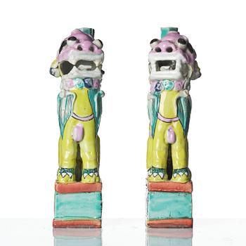 A pair of famille rose 'buddhist lion' joss stick holders, Qing dynasty, circa 1800.