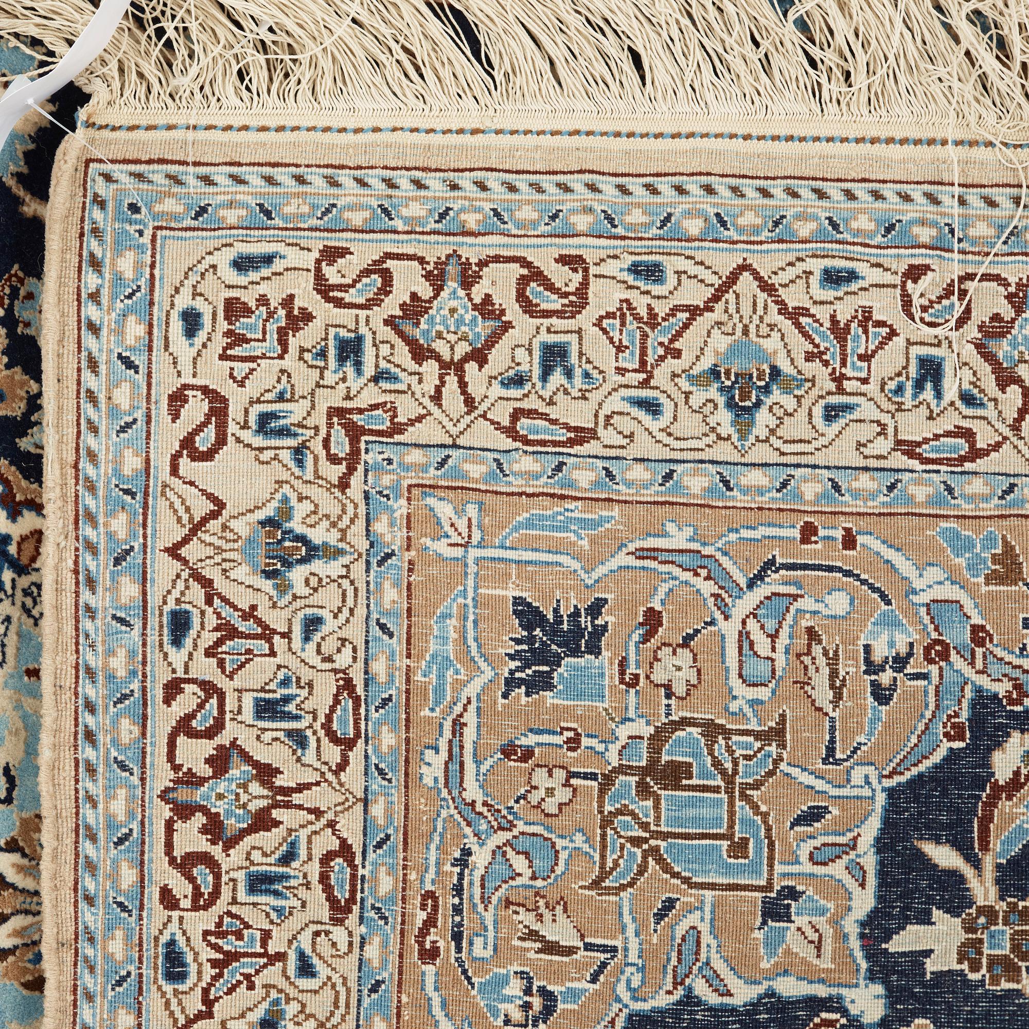 A 6 LAA Nain rug, around  119 x 77 cm.