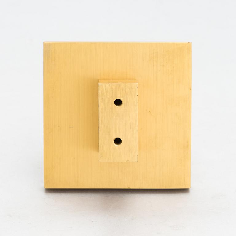 Omega, A door handle from the latter half of the 20th century.