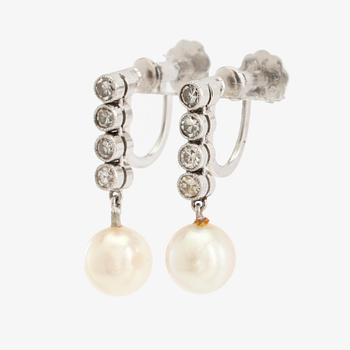 Earrings, a pair of 18K white gold set with round brilliant-cut diamonds and cultured pearls.