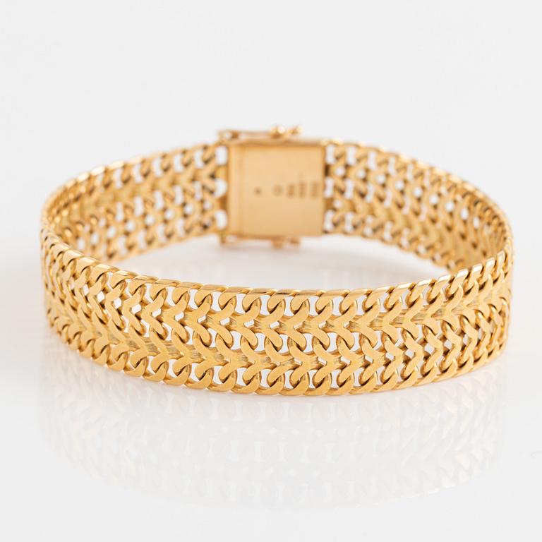 18K gold bracelet, with monograme with diamond.