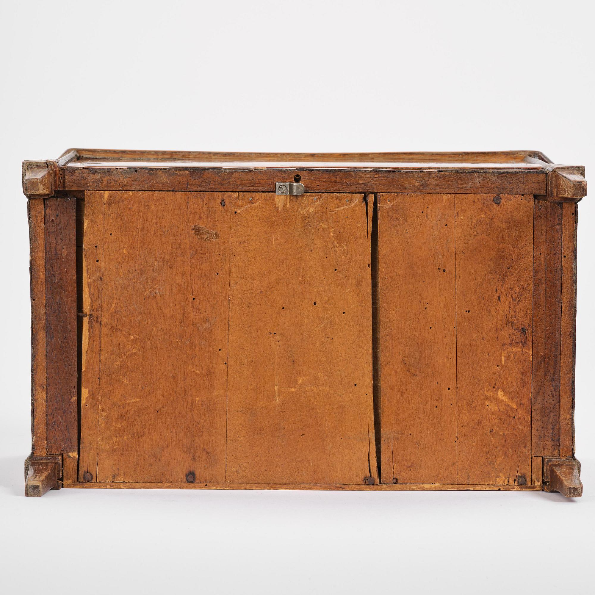 A presumably Italien Louis XVI miniature commode.