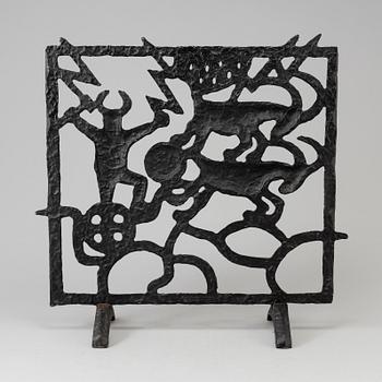 A cast iron fire shield by Olle Hermansson, Husqvarna.
