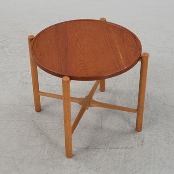 Hans J. Wegner, a model PP35 teak and oak tray table, Andreas Tuck, Denmark, mid 20th Century.