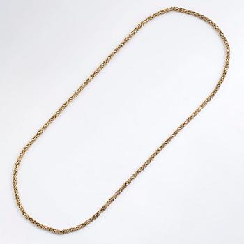 An 18K white and yellow gold necklace. Switzerland.