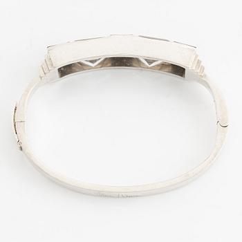 Wiwen Nilsson, a sterling silver bangle set with rock crystal and onyx, Lund 1935.