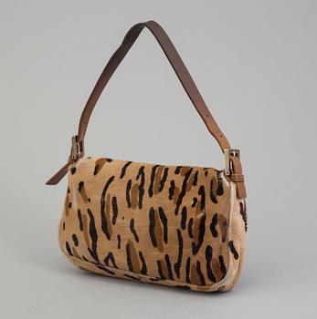 FENDI, a pony hair handbag.