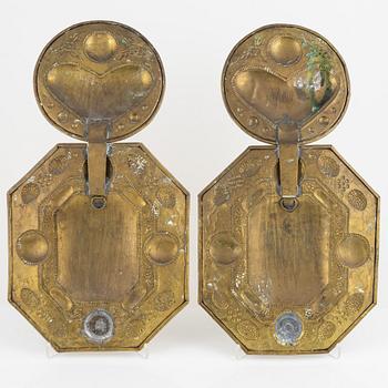 A pair of baroque style brass sconces, around 1900.
