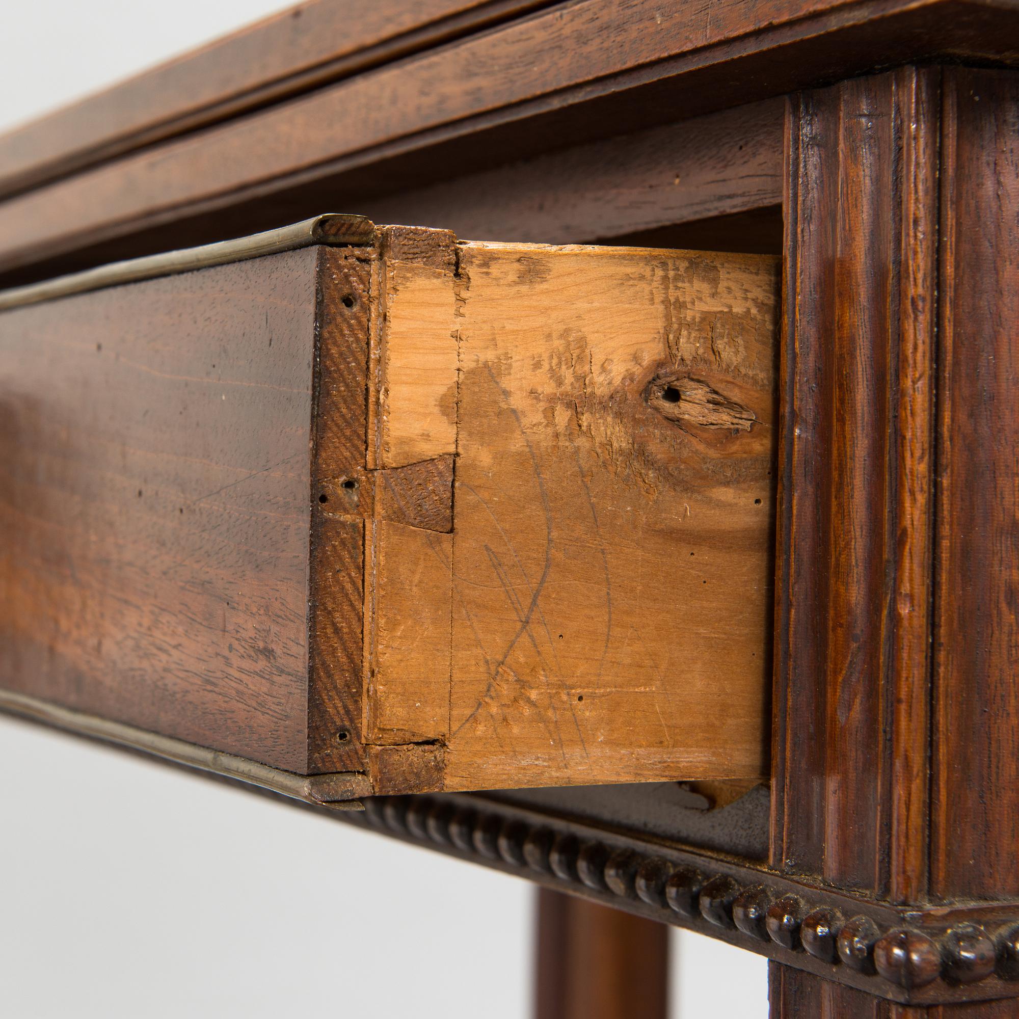 A Gustavian card table around 1800.