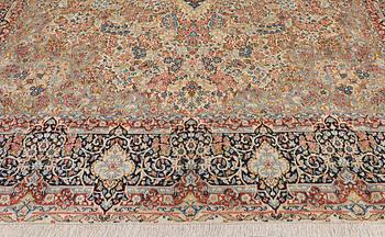 A 'Millefleur' Kerman Laver carpet, c. 398 x 300 cm.