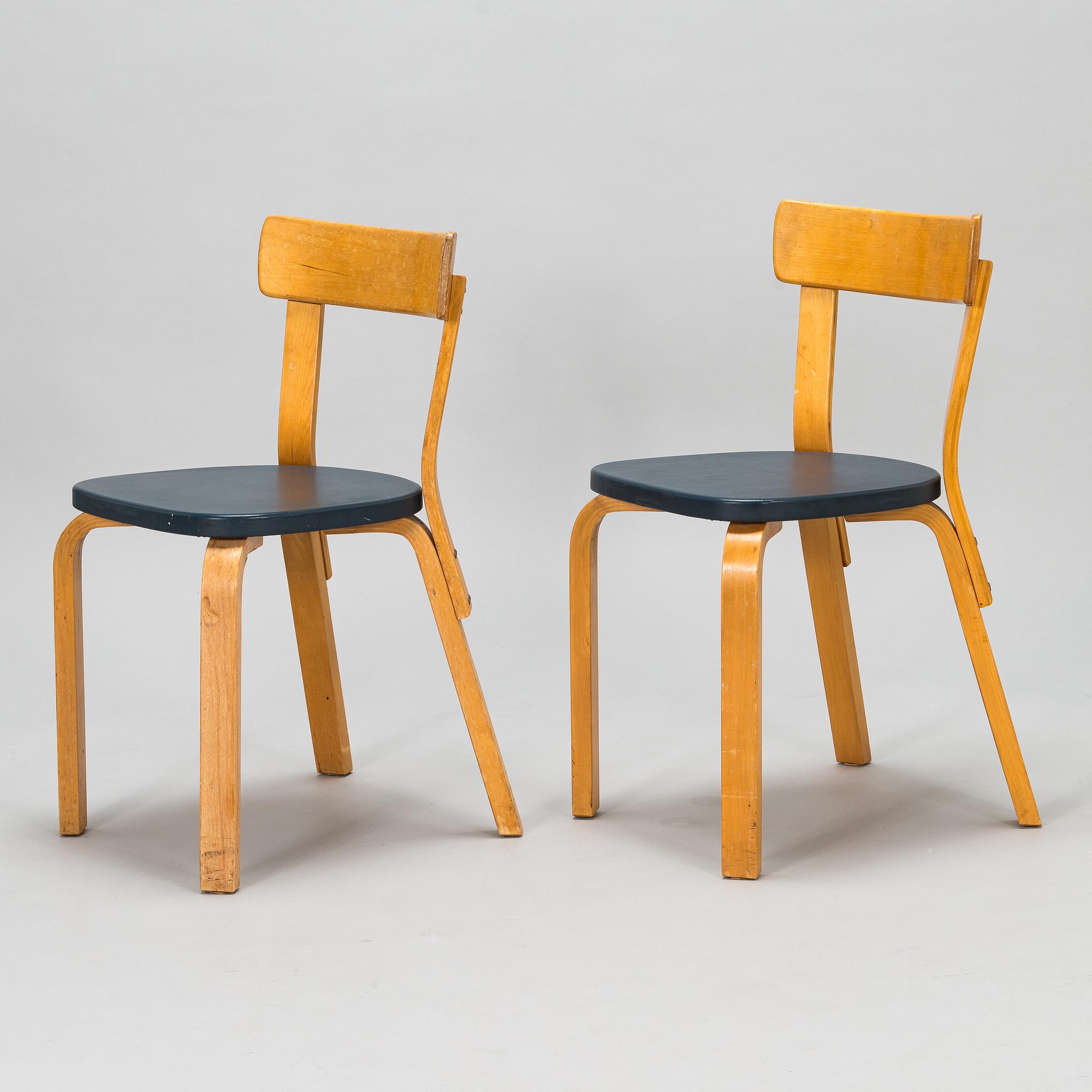Alvar Aalto, A pair of early 1960s model 69 chairs for O.Y. Huonekalu- ja Rakennustyötehdas A.B.