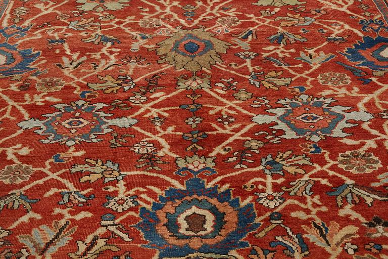 A carpet, an antique Mahal, Ziegler pattern, ca 371,5-374,5 x 265-266 cm (as well as a little flat weave at one end).