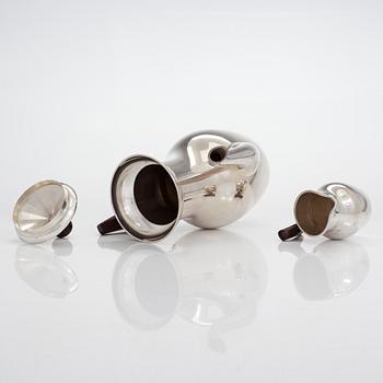 Tapio Wirkkala, a three-piece sterling silver and rosewood coffee set with tray, Kultakeskus, Hämeenlinna  1959-1971.