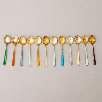 A 24-piece set of 1950s/60s enamelled and gilt silver (916) coffee spoons, Tillander, Helsinki.