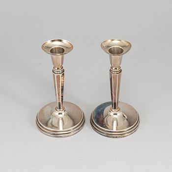 A pair of Swedish 20th century silver candlesticks, mark of Erik Löfman, Uppsala 1979.