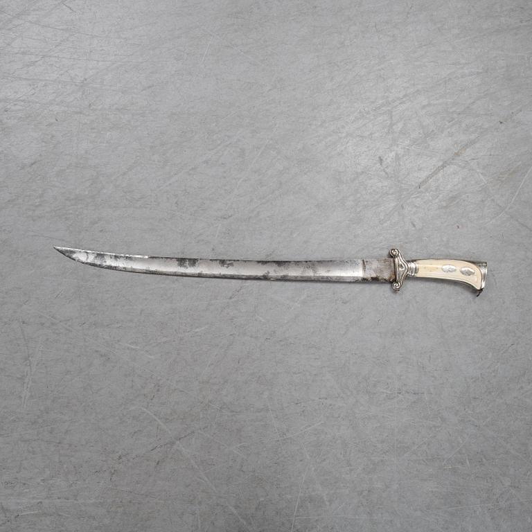 An 18th Century hunting sword with ivory handle.