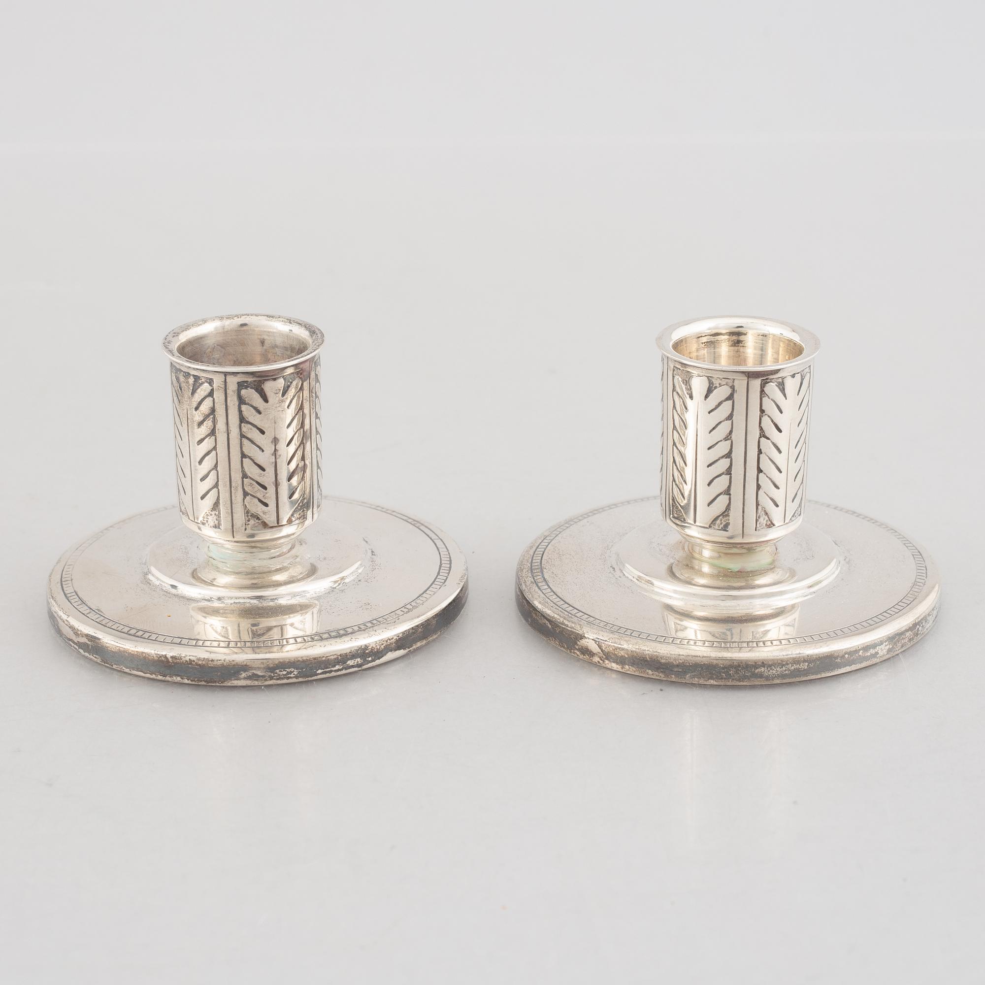 A pair of silver candlesticks, marks of W.A. Bolin, Stockholm, Sweden 1941.