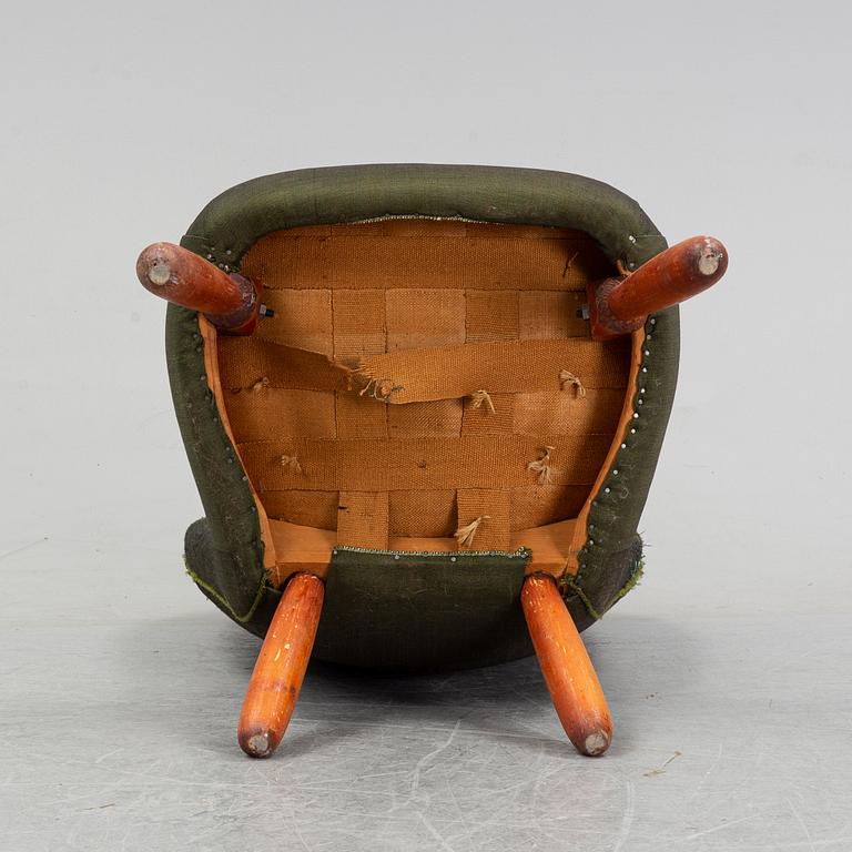 A Swedish Modern 'Clam Chair'/ 'Muslingestol', 1940's-50's.