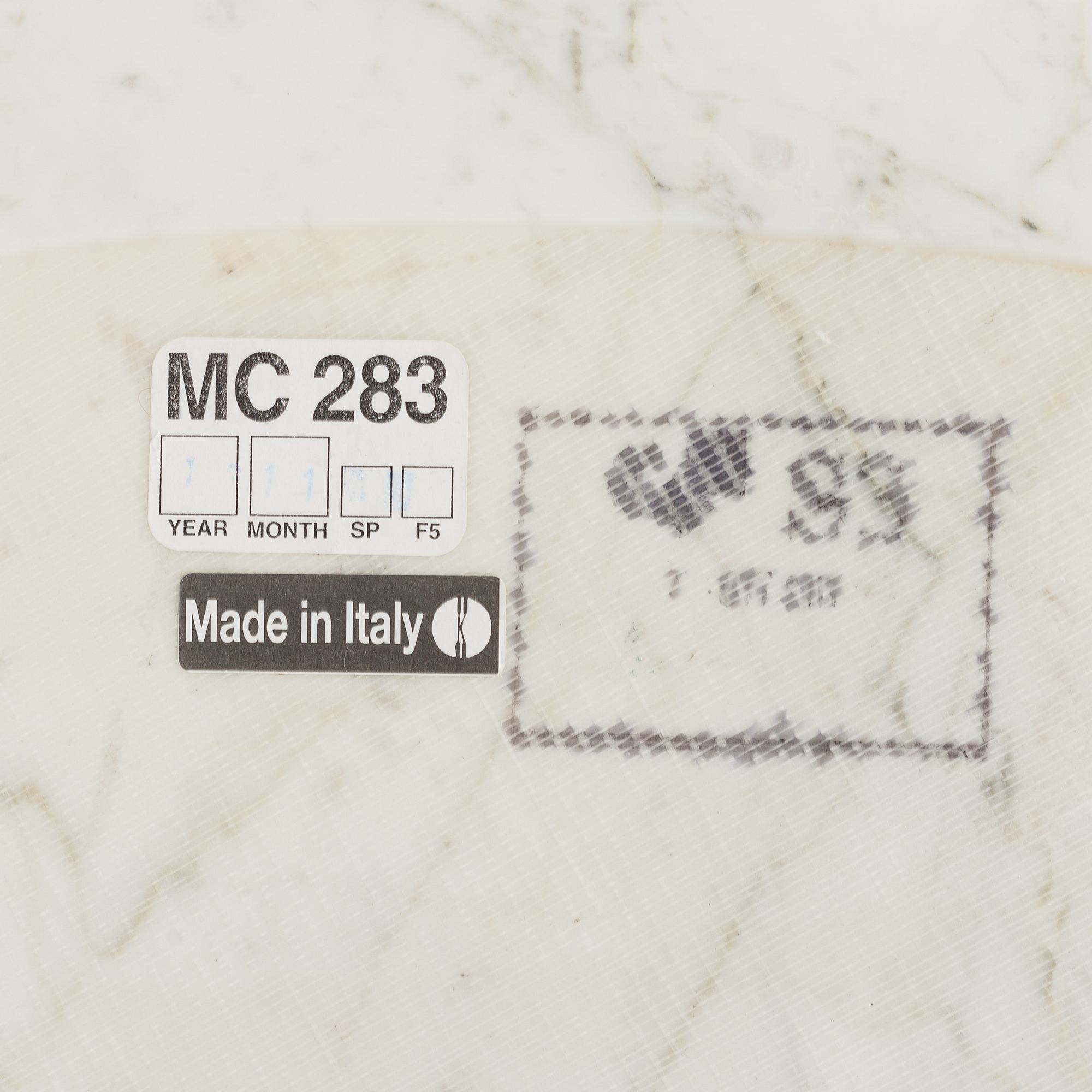 EERO SAARINEN, a 'Tulip' table by Knoll.