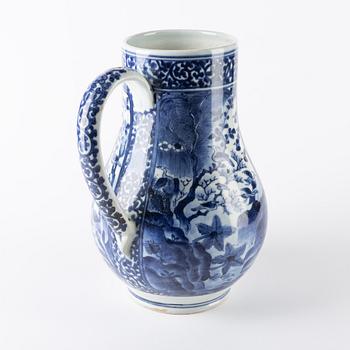 A large Japanese blue and white jug, 17th/18th Century.