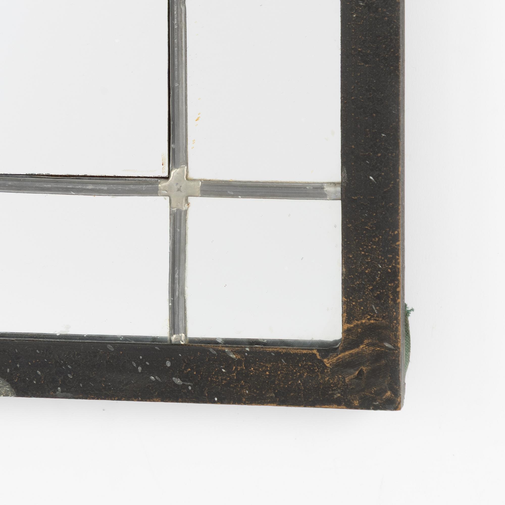 A mirror, mid-20th century.