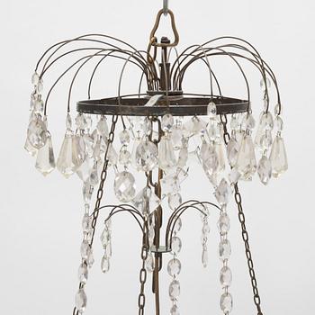 A Gustavian style chandelier, around the year 1900 incorporating older elements.