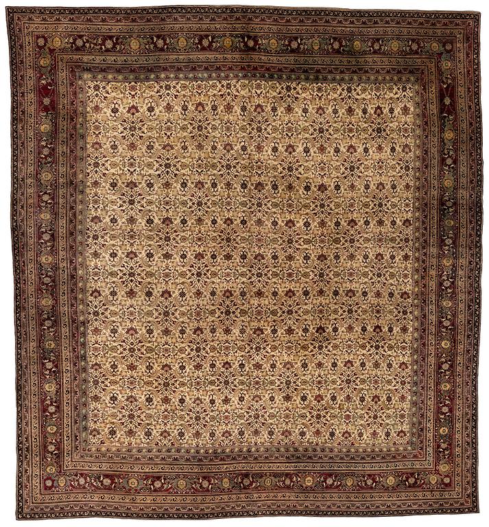 An antique Agra carpet, north India c. 430 x 392 cm.