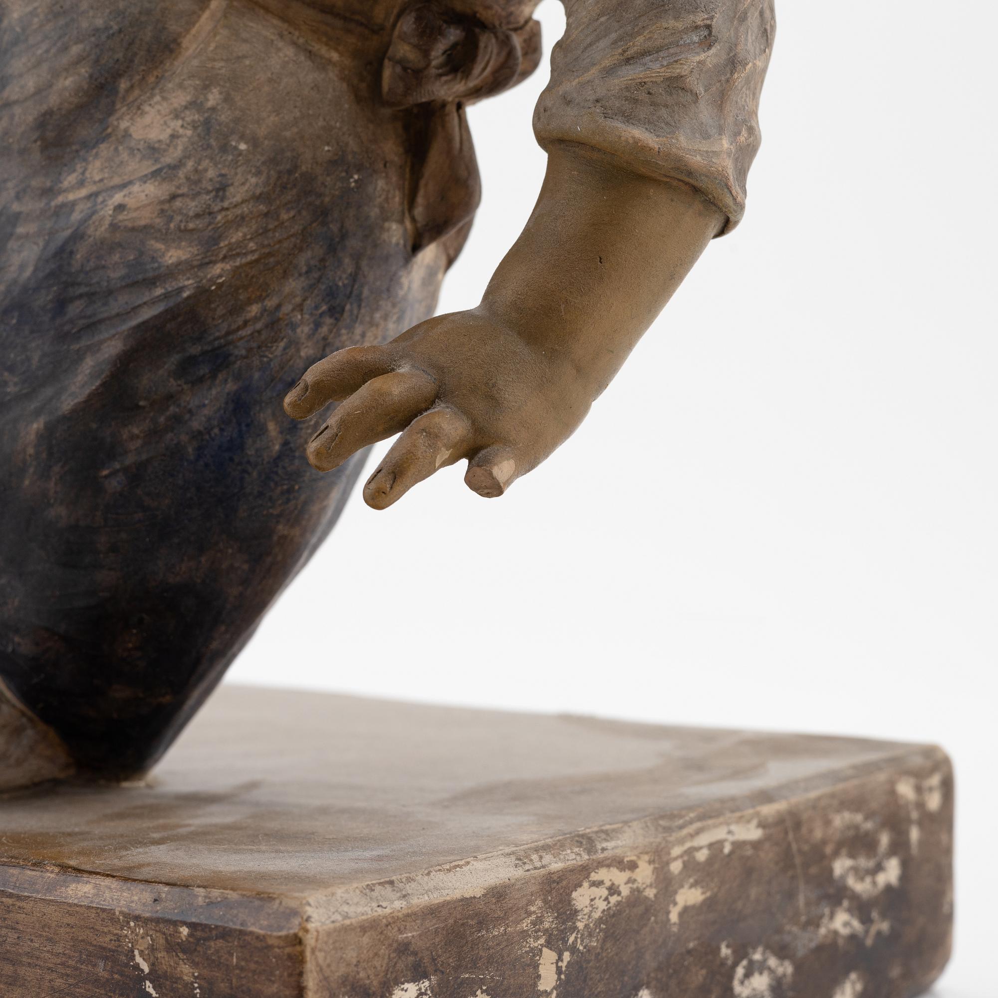 An earthenware sculpture, Europe, signed.